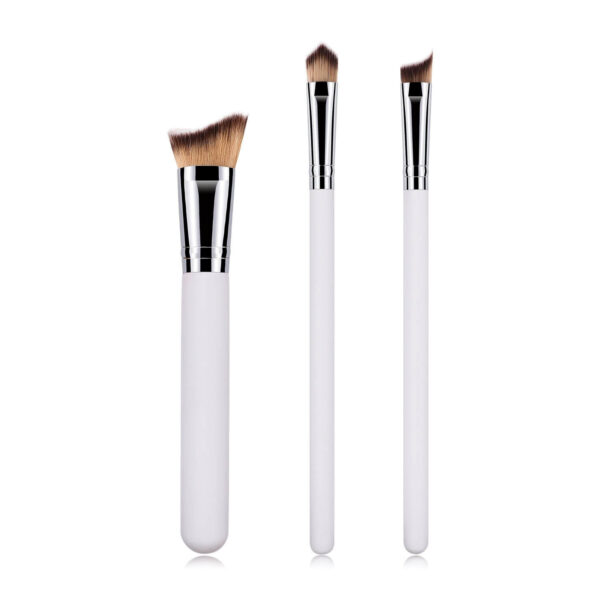 3 piece makeup brush set with white ergonomic handles and vegan bristles on white background